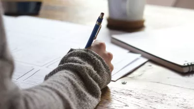 student taking notes 