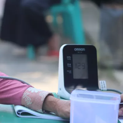 woman getting her blood pressure taken
